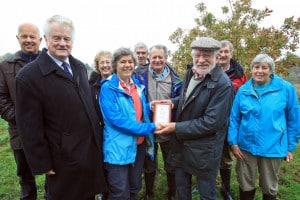 Kate Ashbrook (centre) presents the award to Hugh McCarthy and other members of the Grange Area Trust. Photo: Anita Ross-Marshall, Bucks Free Press