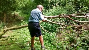 Ken Hawkins tackles a path obstruction