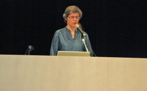 Kate Ashbrook speaking at the IASC conference in Japan after receiving the award on behalf of OSS