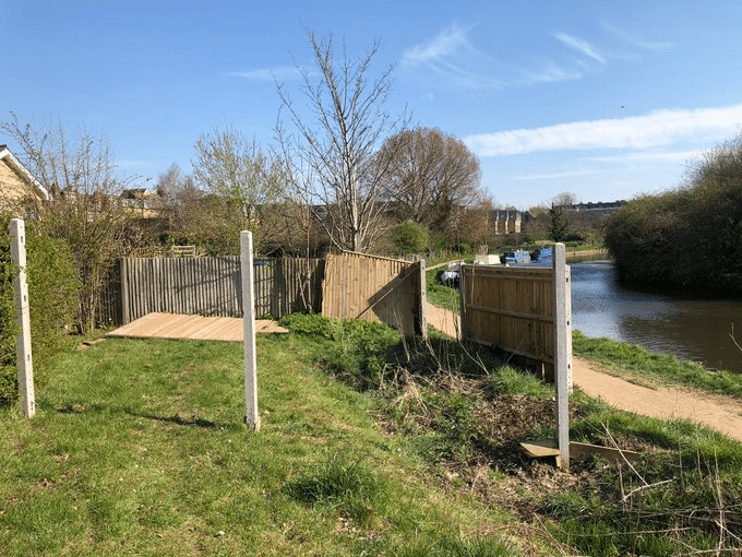 Hanwell fence The fence after local people had broken through to the canal