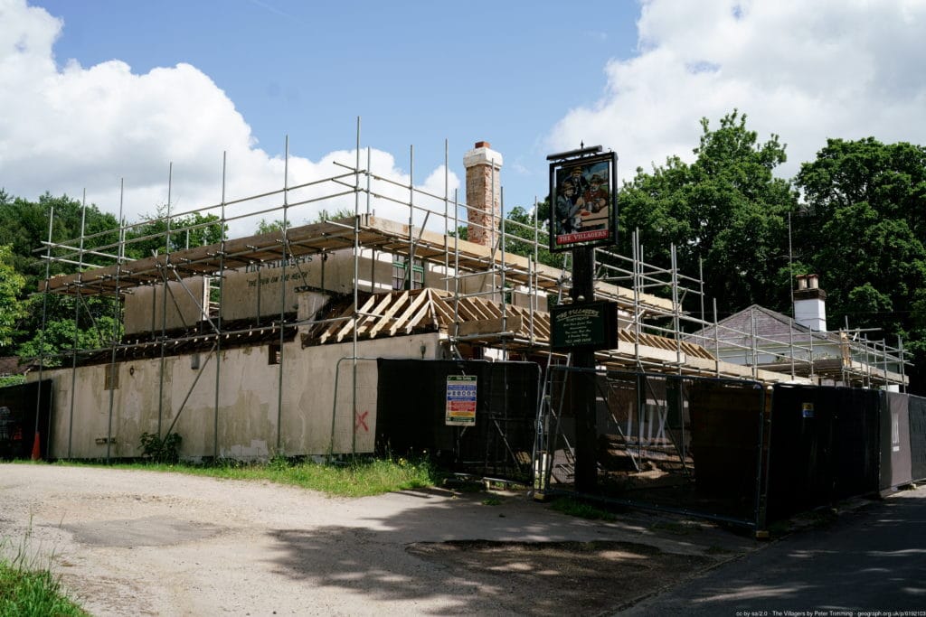 The Villagers, about two years ago, with the entrance to the car park. Photo: Peter Trimming, Creative Commons Licence.