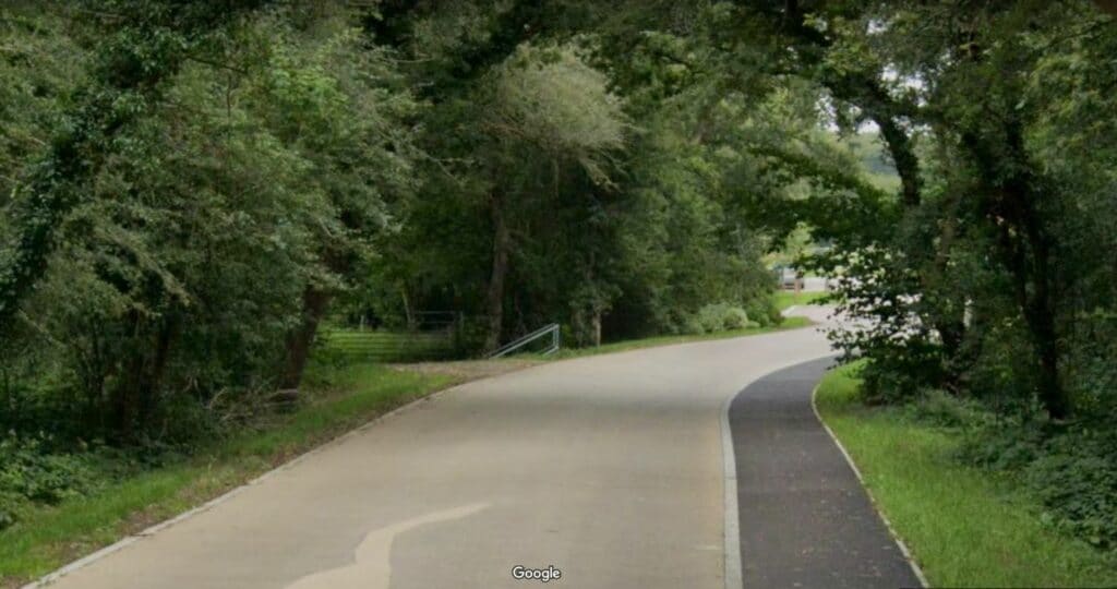 Dunsfold Common, Surrey. The threatened land is to the left of the road. Photo: Google streetview