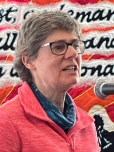 Kate Ashbrook speaking at Hayfield. Photo: Claire Smith. 