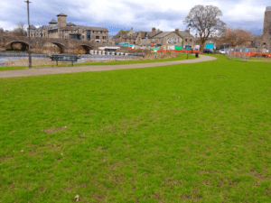 This photo looks across Gooseholme Common, to the area where the public will be separated from the river by a flood-defence wall, and most of the grass will be taken by the hardstanding for the pumping station. Photo: Open Spaces Society