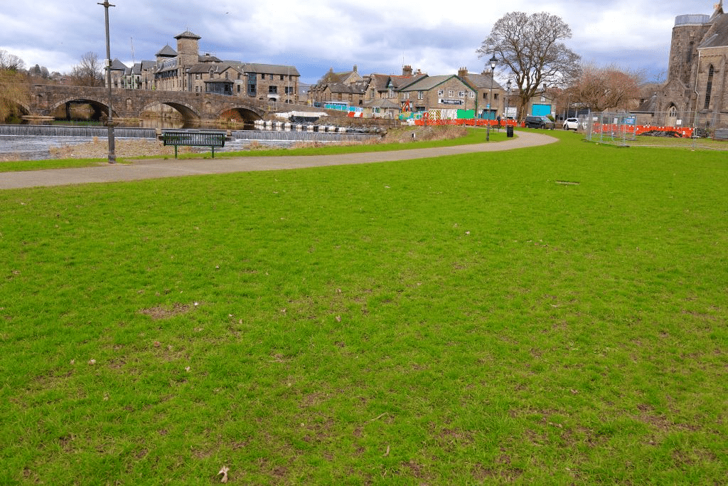 This photo looks across Gooseholme Common, to the area where the public will be separated from the river by a flood-defence wall, and most of the grass will be taken by the hardstanding for the pumping station. Photo: Open Spaces Society